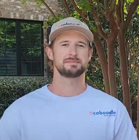 Tyler Wallace outdoors in a Caboodle shirt